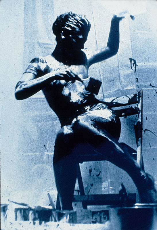 Sandra Binign in performance on Prince st.: Storefront